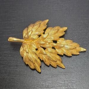 Vintage napier leaf brooch gold